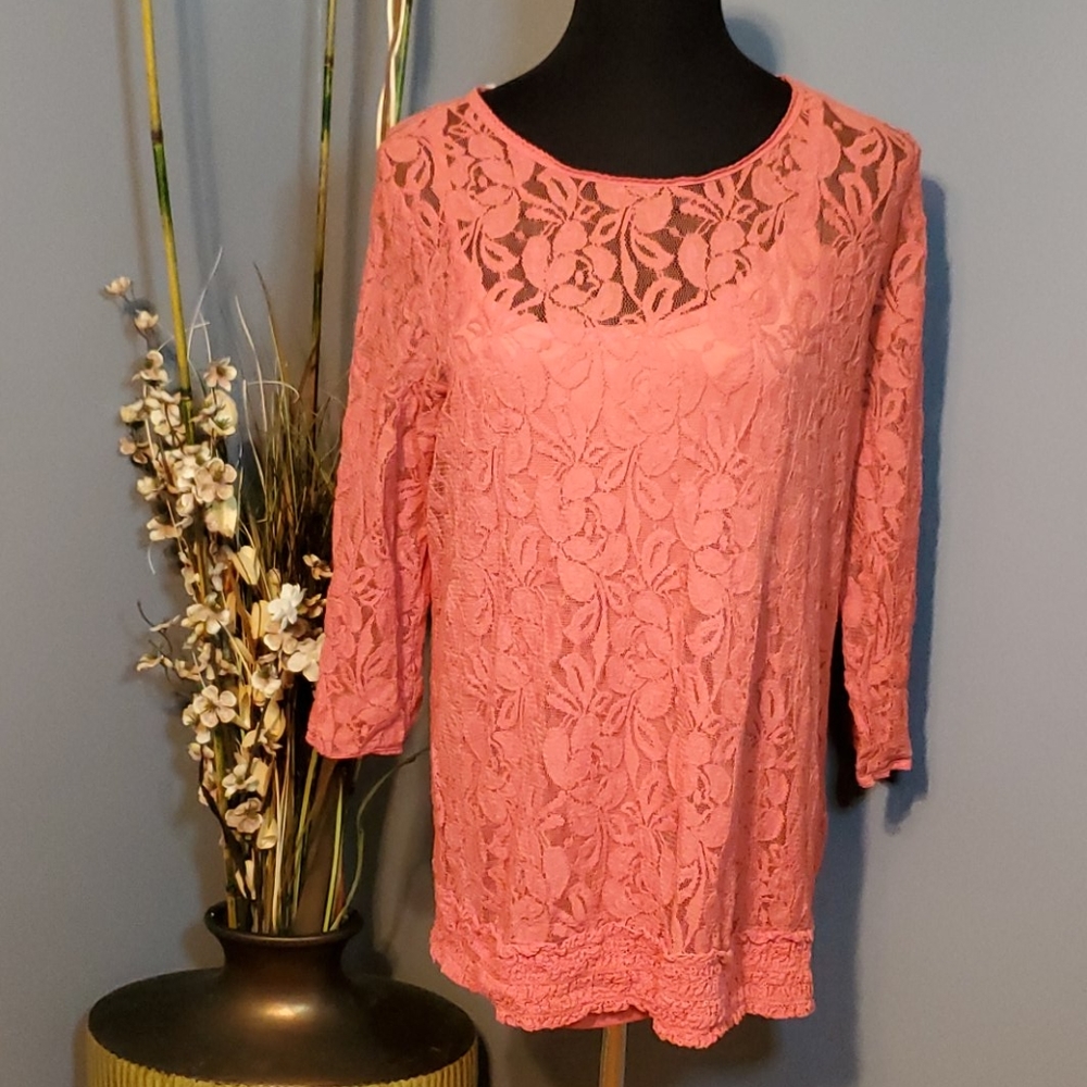 Moto woman's corel / orangish shirt . Very pretty